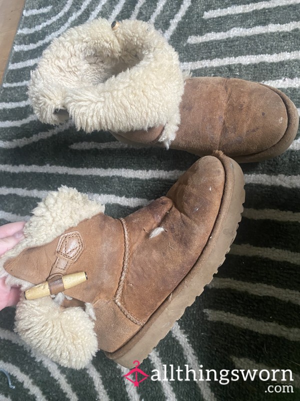 Dirty Worn Sheepskin Boots