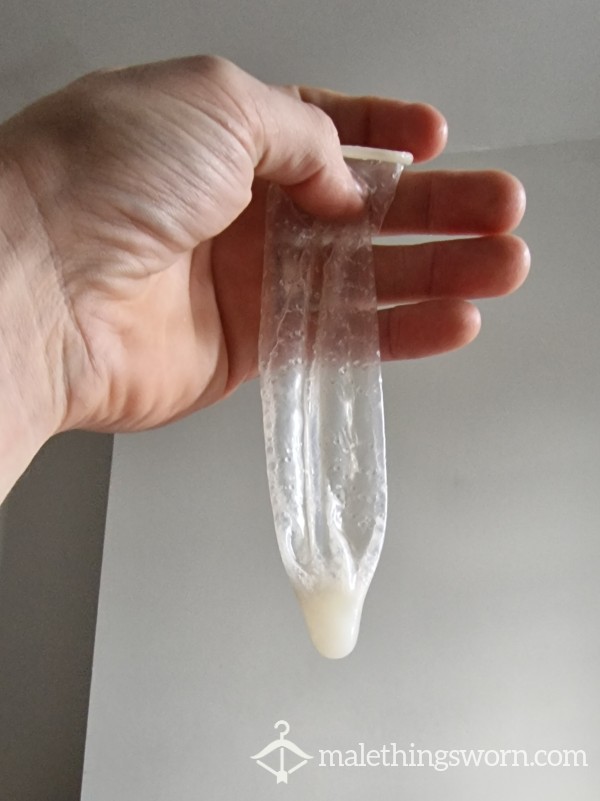 "Grade A Alpha Spunk" Filled Condom