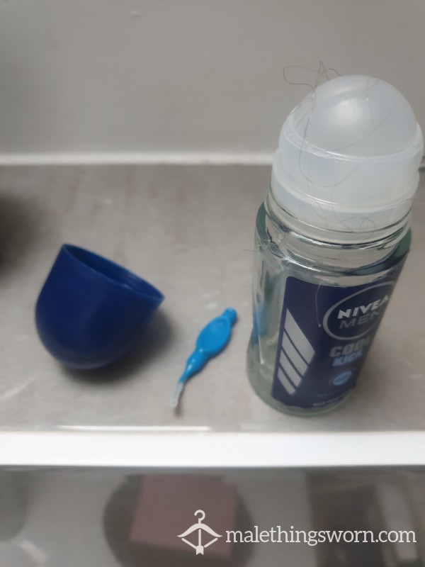 Used Deodorant Bottle And Tooth Cleaner