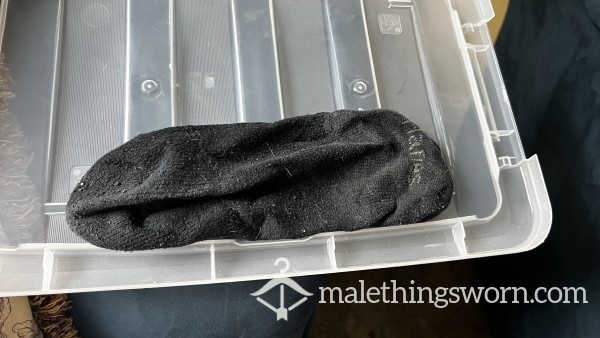 Well-worn Single Black Hanes Sock