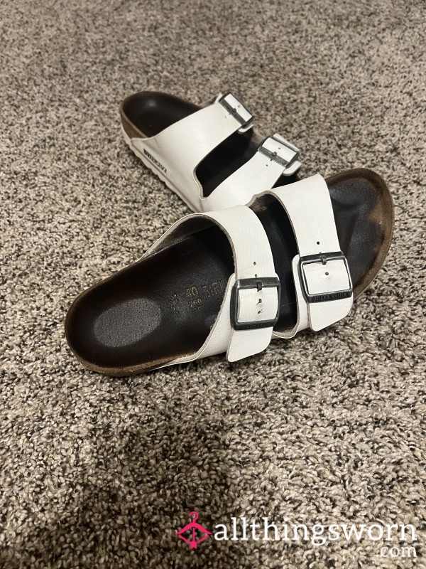 Well-worn White Birkenstocks