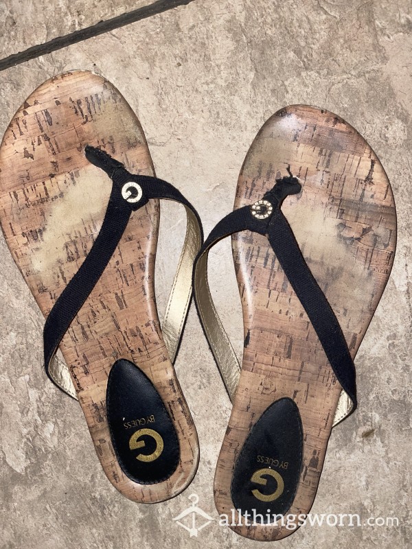 Worn Guess Flip Flops